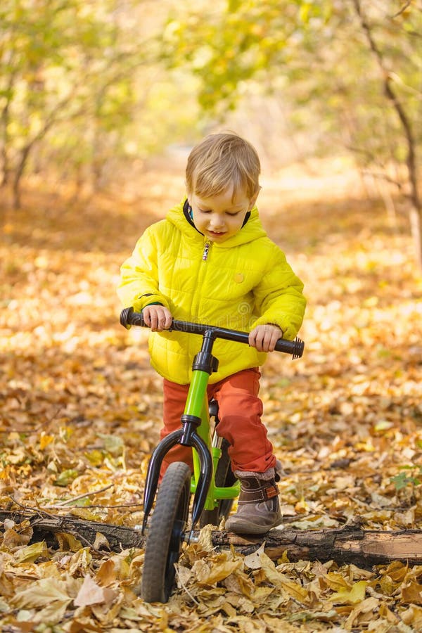 little boy riding bike
