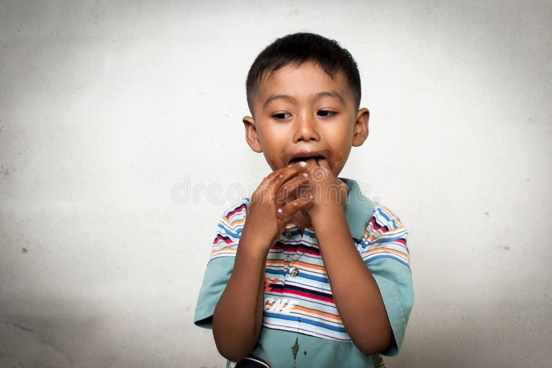 Cute little boy show dirty hand royalty free stock image