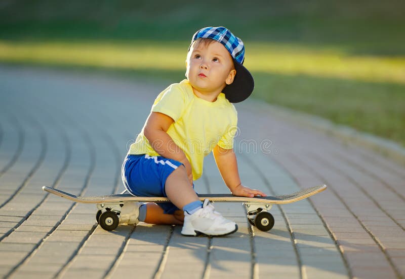 Cute Little Boy with Skateboard Outdoors Stock Image Image of balance