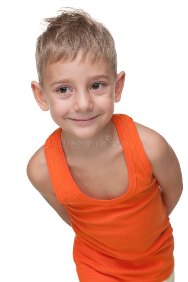 Boy stands on his head. stock image. Image of sofa, child 16348665