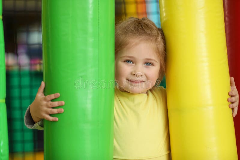 Cute little child playing at amusement park royalty free stock image Cute little child playing at amusement park royalty free stock image