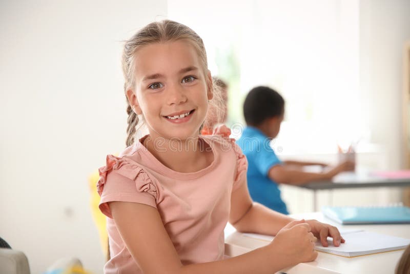 School Child Sitting In Classroom Stock Image Image Of Happy