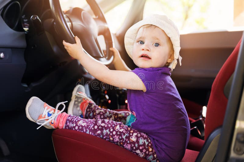 Child steering wheel in the car stock images Child steering wheel in the car stock images