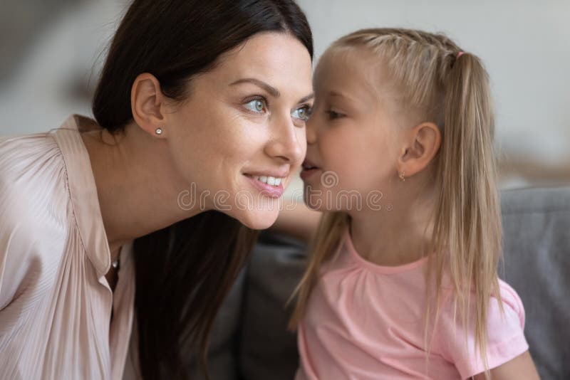 Little Daughter Telling Secret To Smiling Mother Whispering In Ear Stock Image Image Of Chat