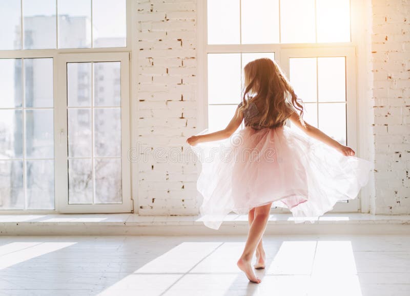 Cute little girl in dress stock images