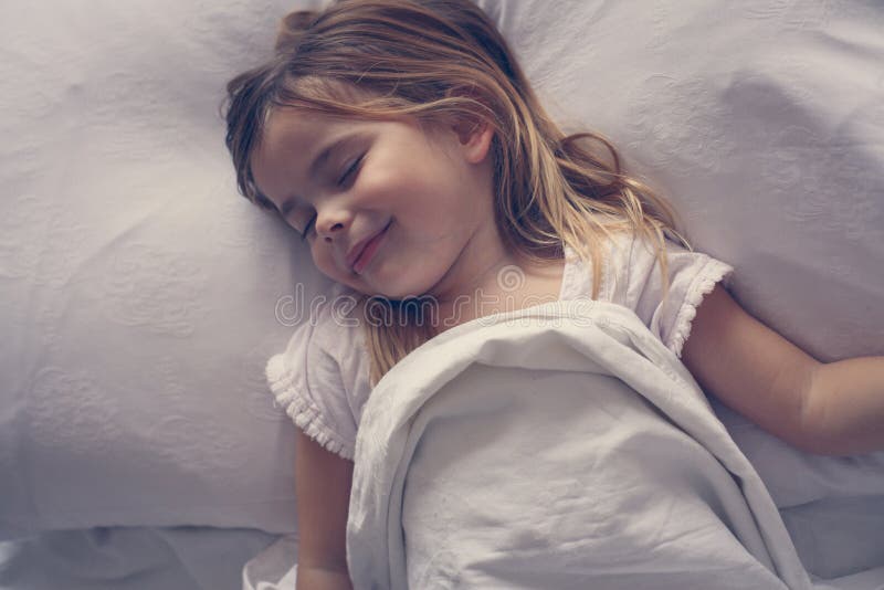 Cute little girl in bed. stock image. Image of lifestyle 98434629