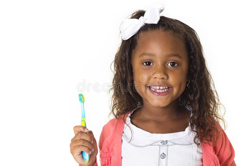 Cute Little Girl Brushing her teeth stock images