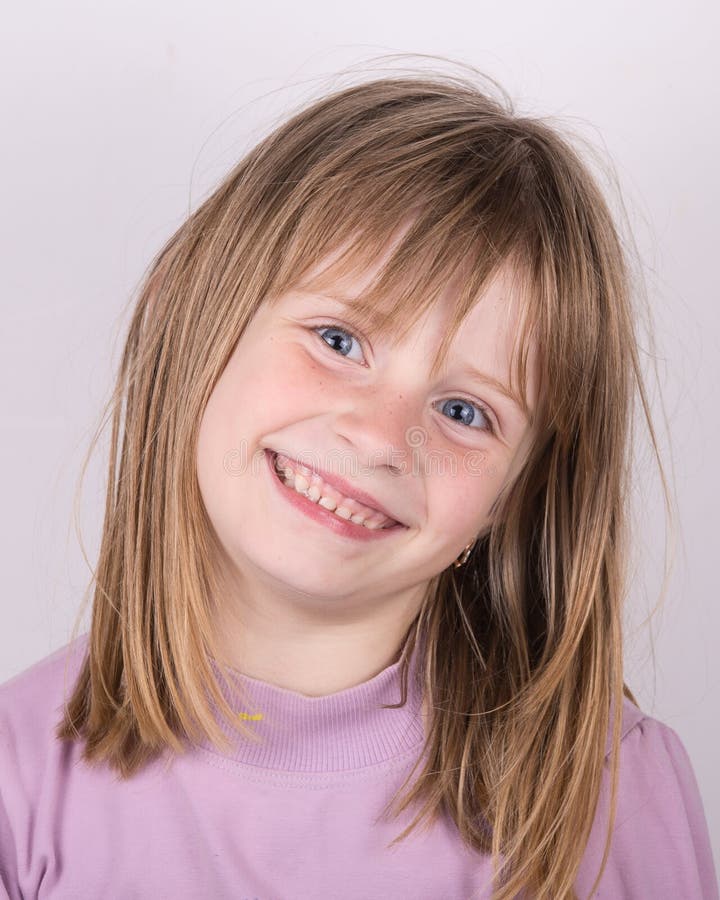 Close up portrait of a cute little girl of 7-8 years old leaning to pink  wall Stock Photo by ©annanahabed 122304756