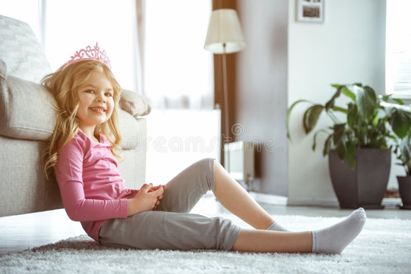 Cute Little Girl Dreaming in Living Room Stock Image - Image of leisure ...
