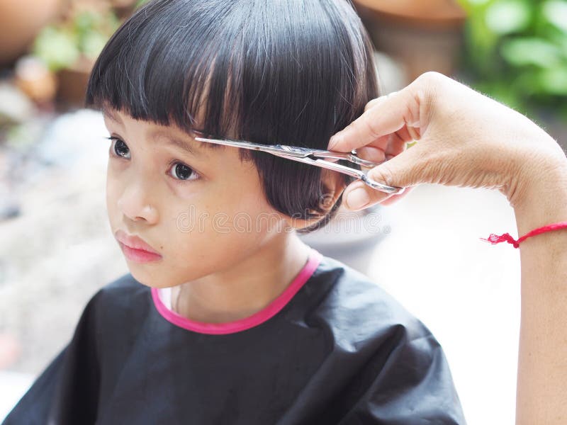Cute Little Girl Getting Hair Cut Stock Image - Image of background,  dressing: 181654705