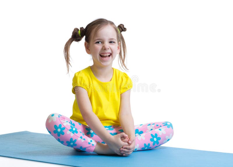 Cute little girl goes in for sports on a white background stock photo Cute little girl goes in for sports on a white background stock photo
