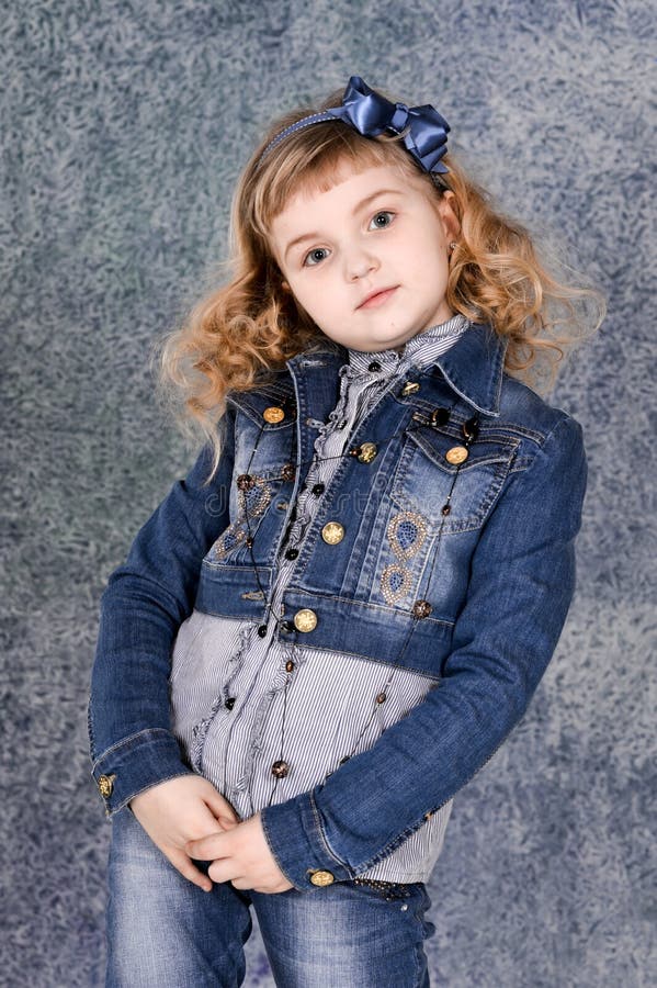 Little Girl in Jeans Jacket Posing Stock Image - Image of studio ...