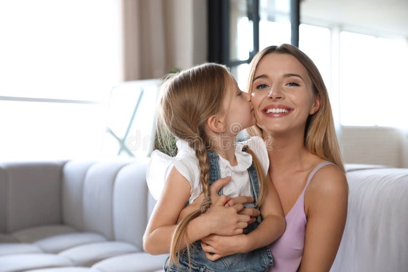 Girls Kissing On Sofa