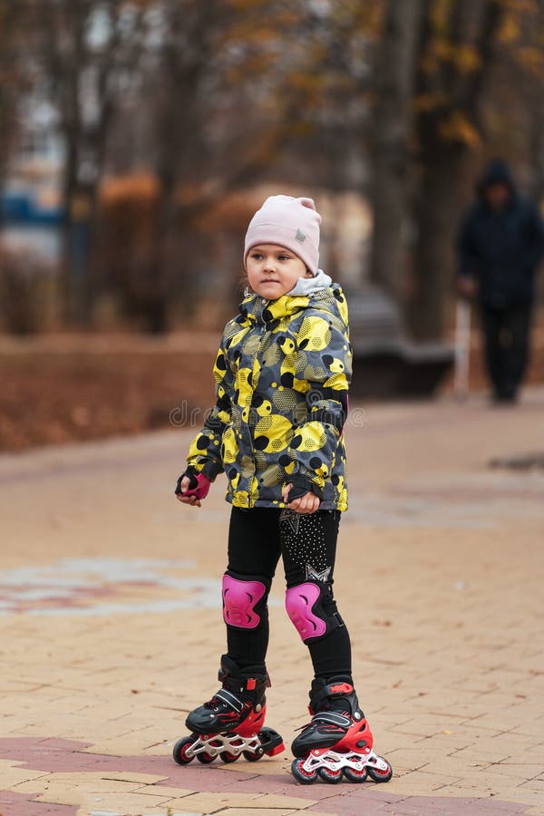 Cute Little Girl Learning To Roller Skate Stock Image Image of ride