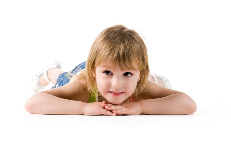 Cute little girl lie on the floor