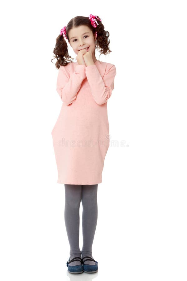 Shy girl holding hands near the face. royalty free stock image Shy girl holding hands near the face. royalty free stock image