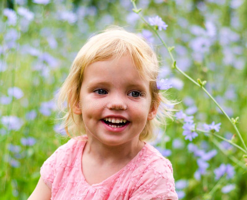 Cute Little Girl in a Pink Dress Smiling in Park Stock Image - Image of ...