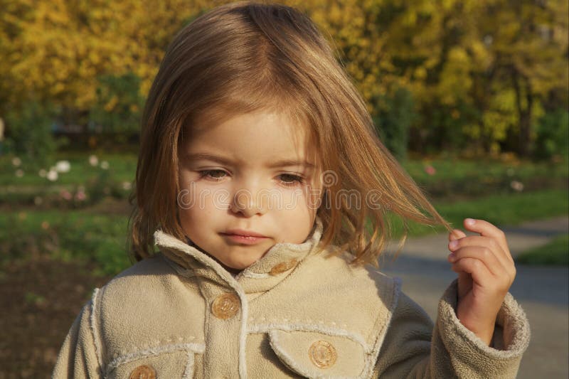 Cute Little Girl Playing with Her Hair Stock Image Image of