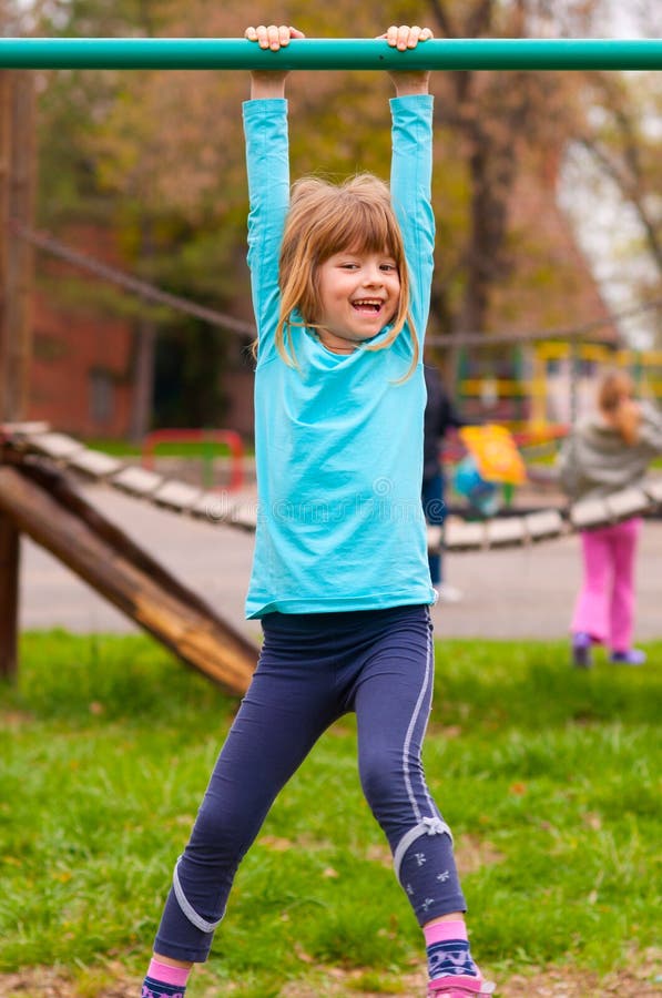 Cute Little Girl Playing on the Playground Stock Photo Image of