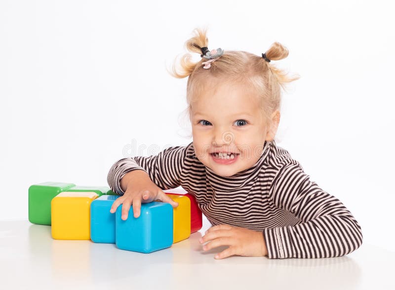 Cute Little Girl Plays with Blocks Stock Photo Image of cheerful