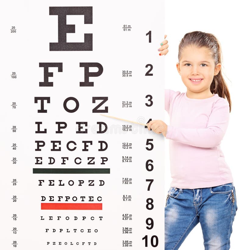 Cute little girl pointing at an eyesight test with stick