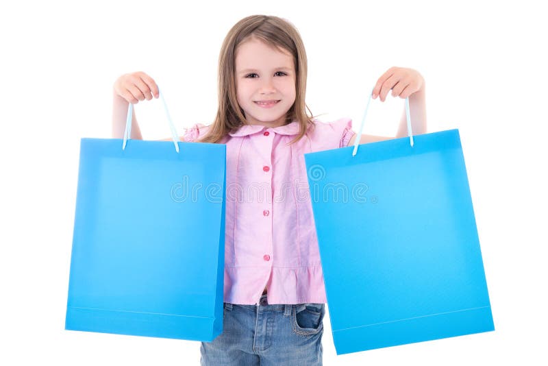 Cute little girl with shopping bags isolated on white