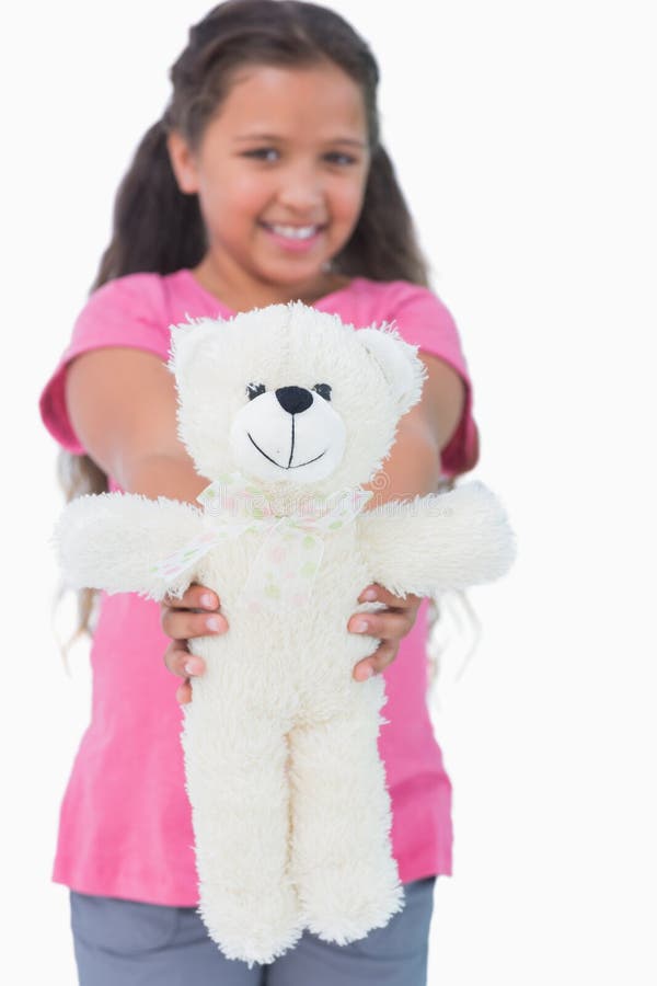 Cute Little Girl Showing Her Teddy Bear To Camera Stock Image - Image ...