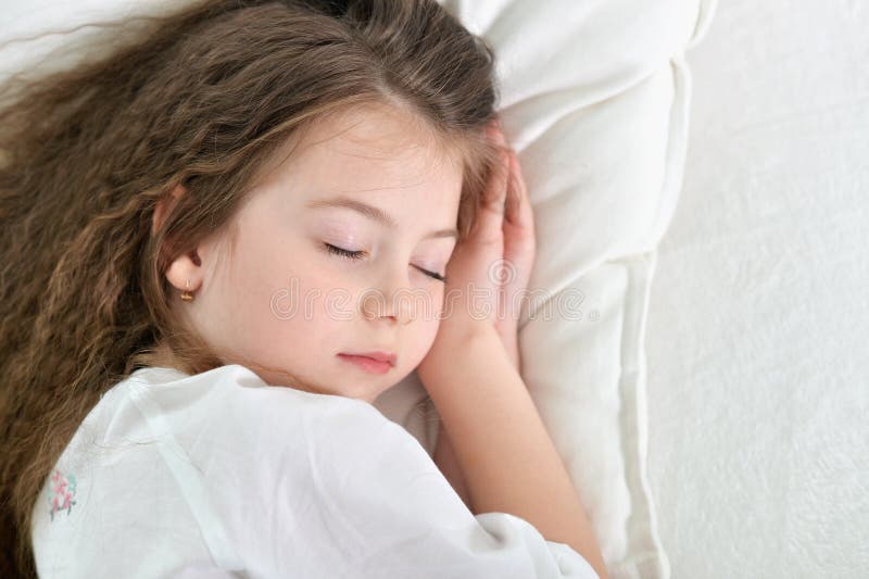 Cute little girl sleeping stock image. Image of girlhood 77967181
