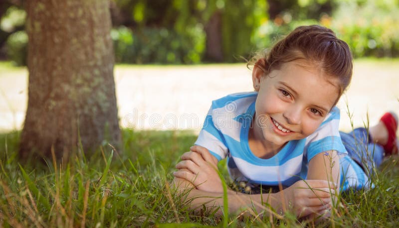 Cute Little Girl Smiling at Camera Stock Image - Image of sunlight ...