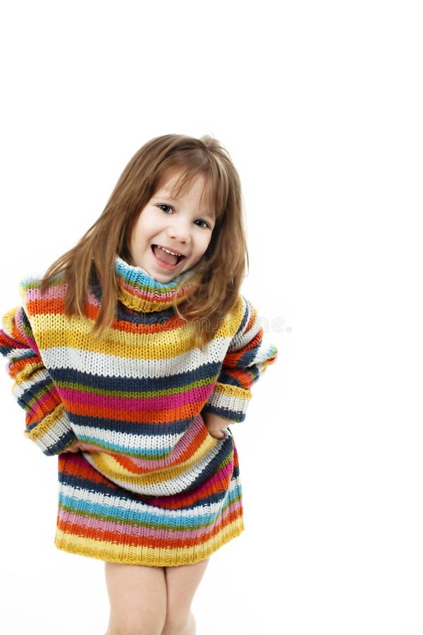 Cute Little Girl In A Striped Sweater Royalty Free Stock Photography