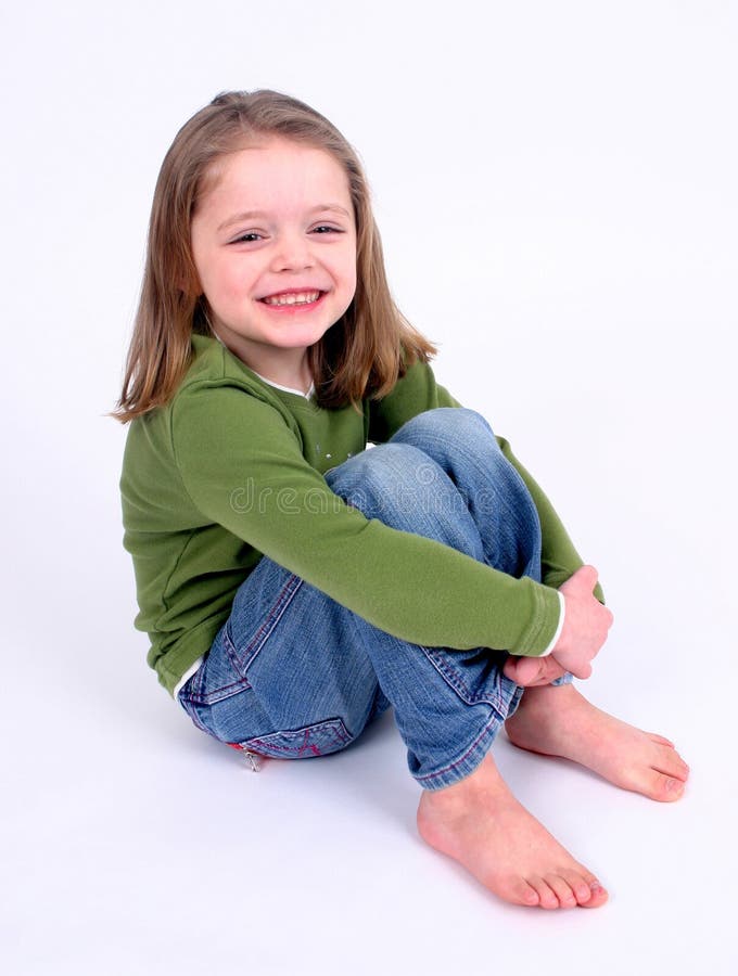 Cute little girl on white