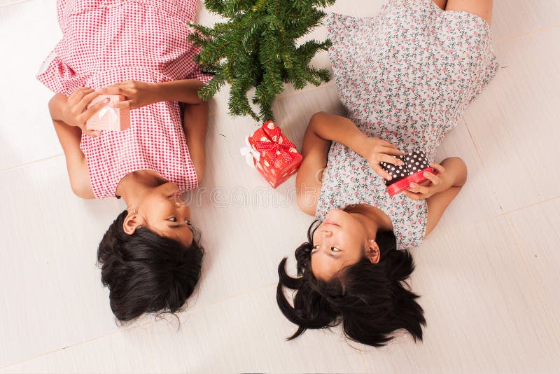 Cute little girl white gift box stock image