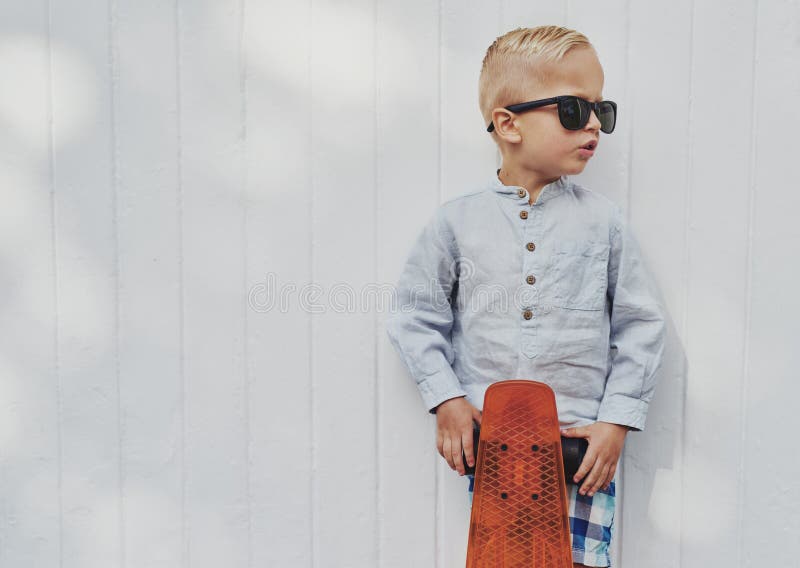 Cute little guy in big trendy sunglasses