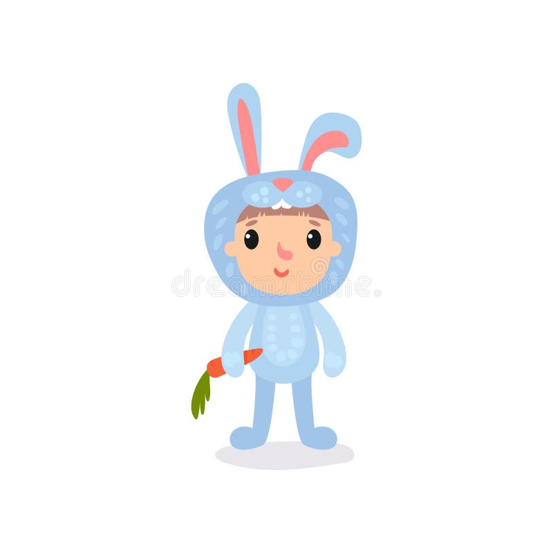 Cute little kid in blue bunny costume standing with carrot in hand. Cartoon child character dressed in animal jumpsuit