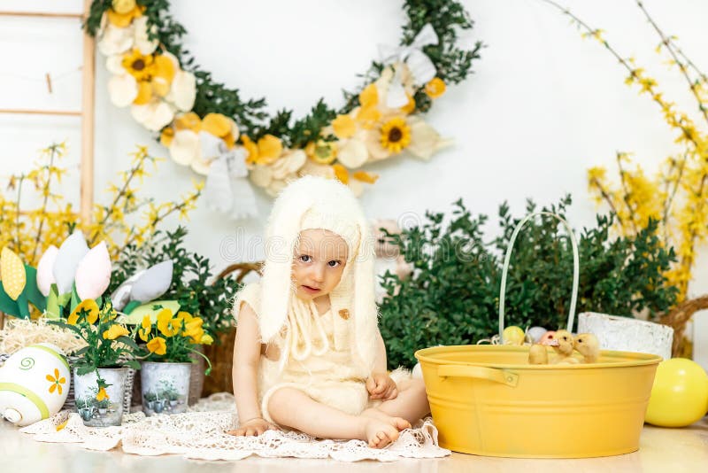 Cute little kid boy with Easter bunny ears celebrating traditional feast. Funny child. Family, holiday, spring , carefree stock photography Cute little kid boy with Easter bunny ears celebrating traditional feast. Funny child. Family, holiday, spring , carefree stock photography