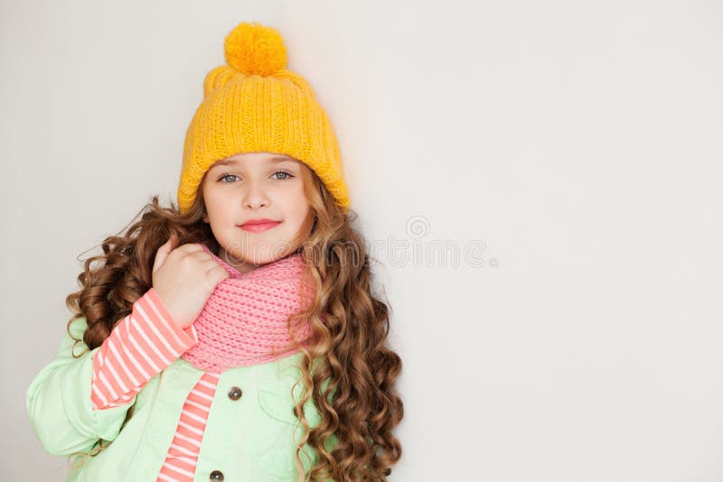 Cute Little Lady Wearing Yellow Woolen Cap and Warm Scarf Stock Photo ...