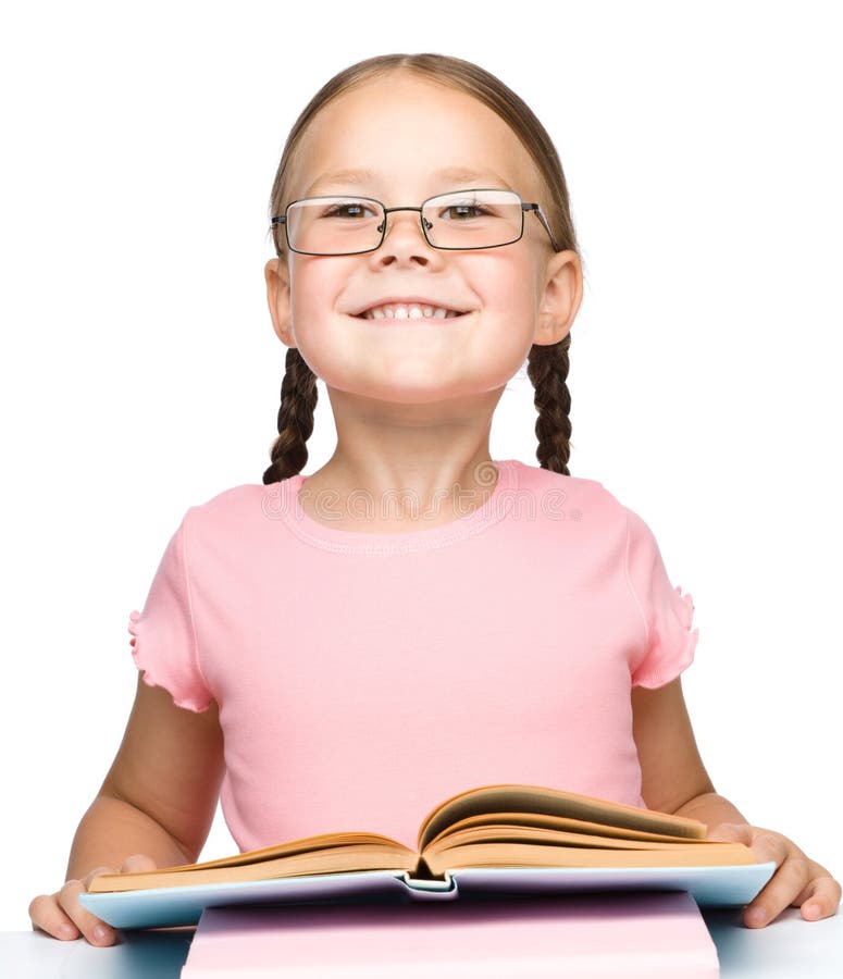 Cute little schoolgirl with a book royalty free stock photo Cute little schoolgirl with a book royalty free stock photo
