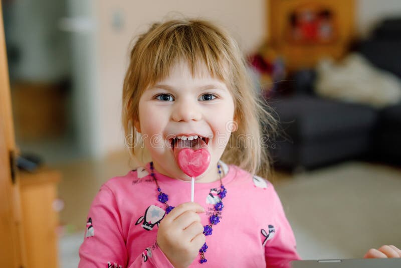 Young Teen Licking Teeth