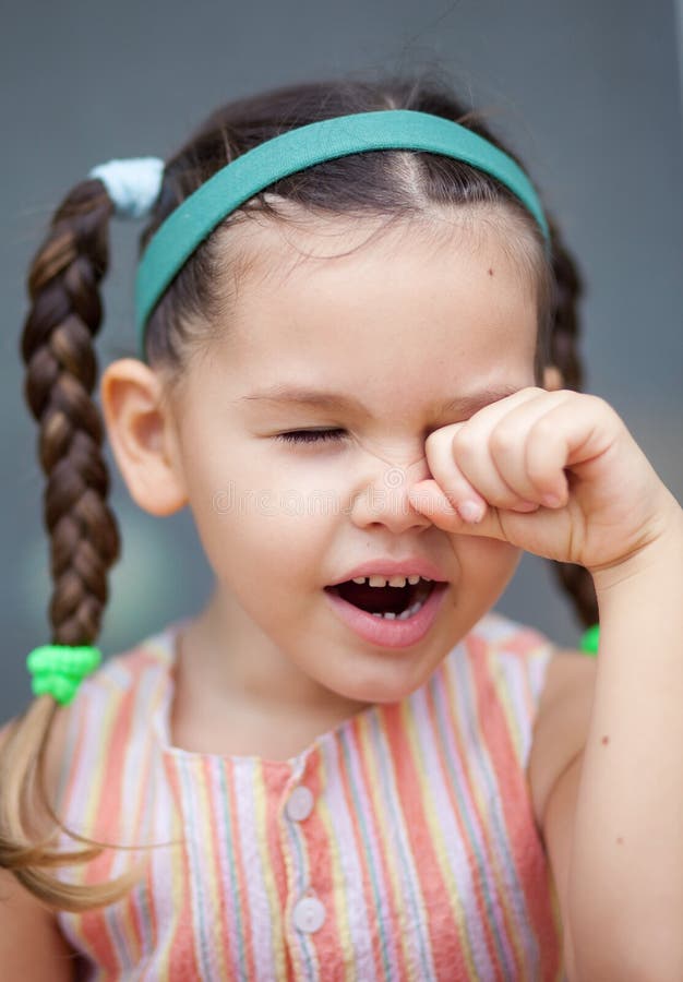 Cute little аsian girl with pigtails