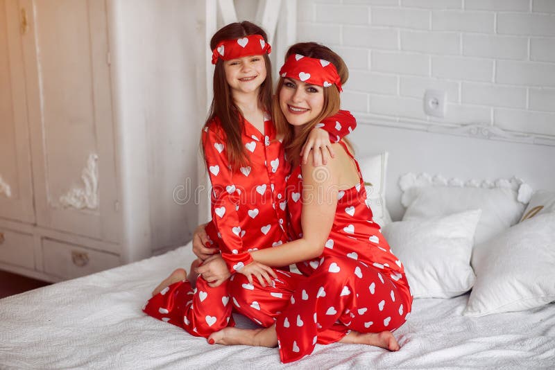 Cute Mother and Daughter at Home in a Pajamas Stock Photo - Image of ...