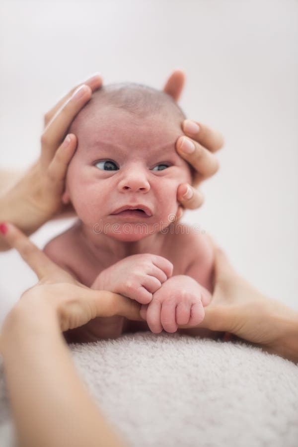 cute newborn baby boy smiling open eyes looking soft white blanket background awake s eyes 59570869