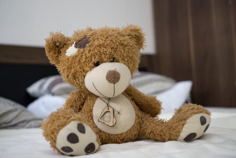 Teddy bear on the bed. Slovakia