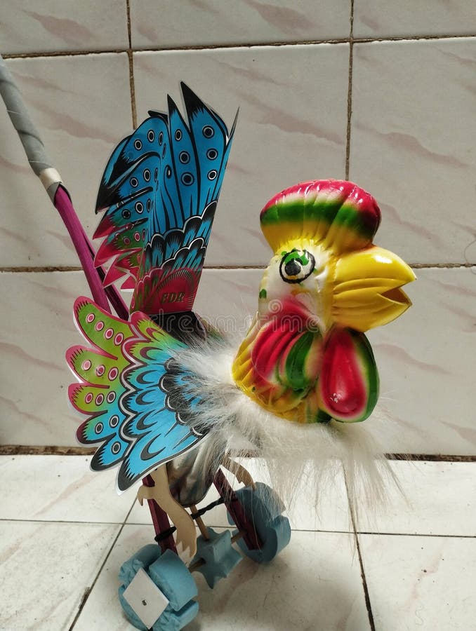 A cute rooster toy for kid stock image. Image of hobby 265725819