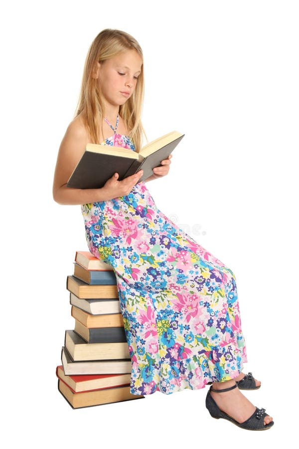 Cute School Girl Sitting on Books