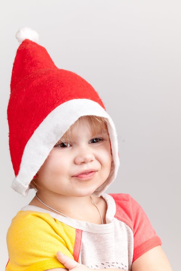 Cute Smiling Caucasian Little Girl In Red Santa Hat Stock Image - Image ...