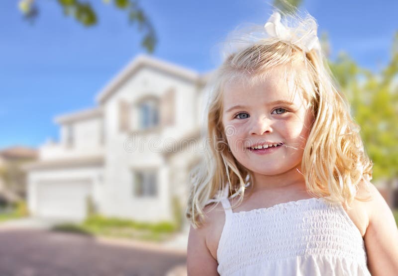 Cute Smiling Girl Playing in Front Yard