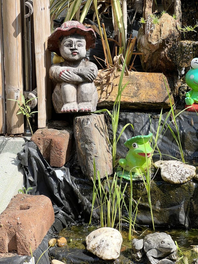 Cute Statue in Nature Garden Stock Photo Image of rock, sunlight