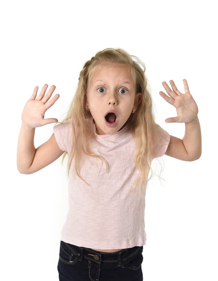 Cute and sweet little girl in disbelief and surprise face expression looking amazed in schock royalty free stock image Cute and sweet little girl in disbelief and surprise face expression looking amazed in schock royalty free stock image