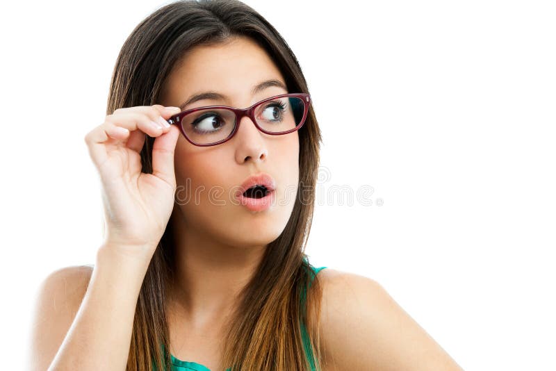 Cute teen girl with glasses looking aside.