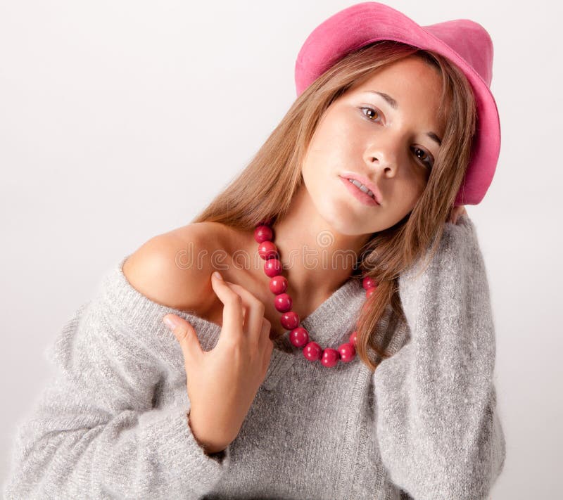 Cute Teen in Pink Hat and Necklace